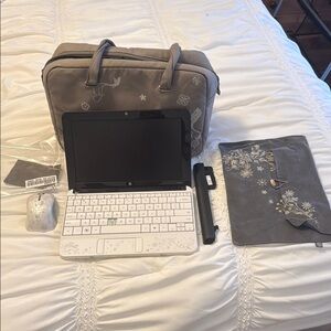 HP Laptop with Accessories in Gray and White